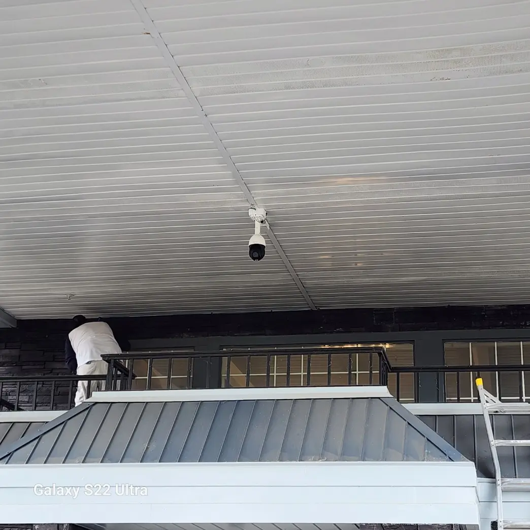 PTZ camera covering a sheltered hotel entry