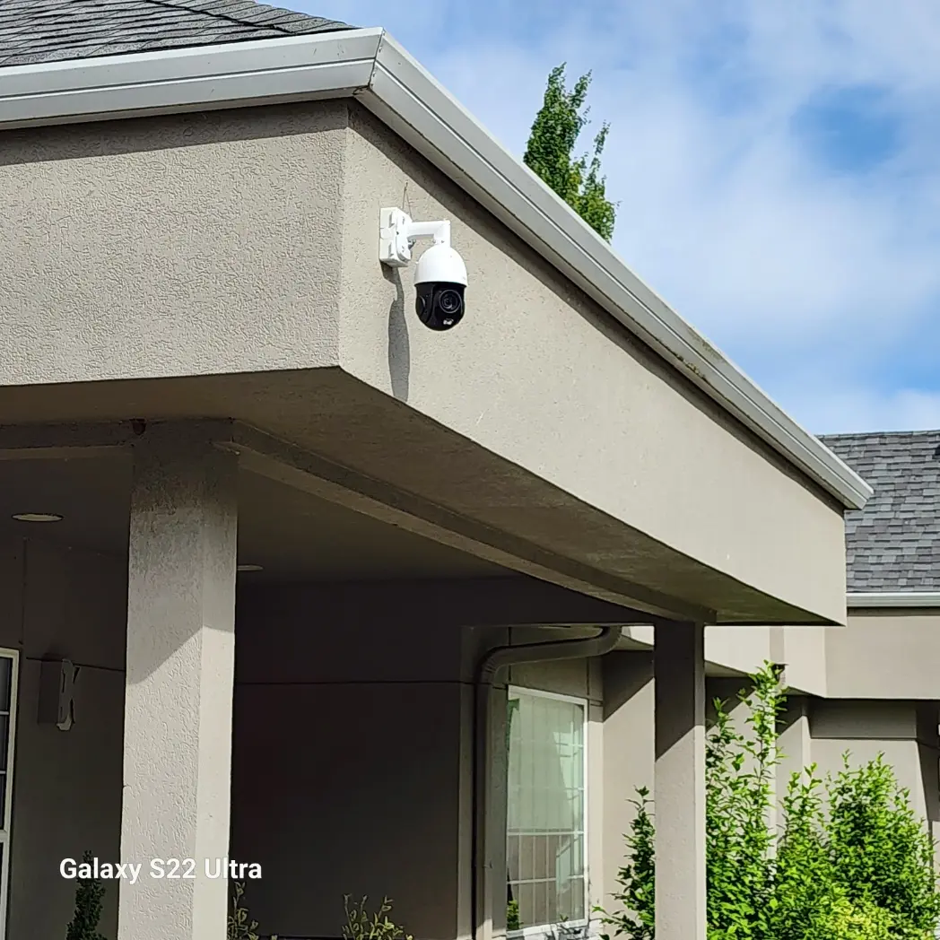 Corner-mounted exterior PTZ security camera