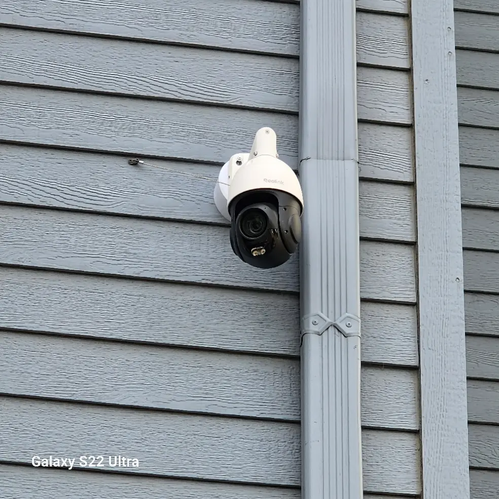 Close-up of an exterior Reolink PTZ camera